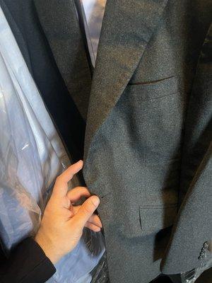 Suit with lapel ironed incorrectly