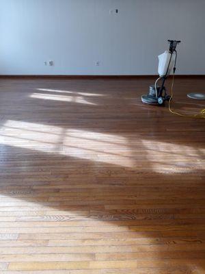 Wood floors before and after buffing.