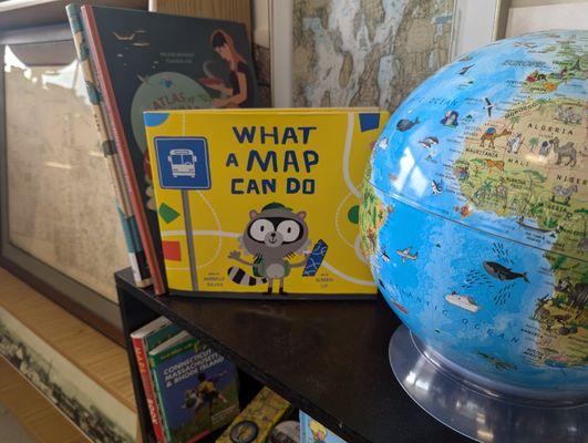 A kids section with fun globes and atlases to inspire exploration