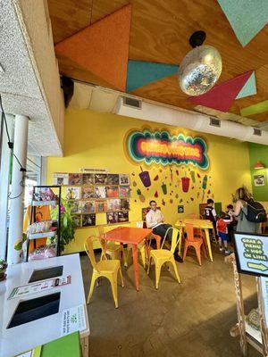 Indoor seating area. Very colorful!