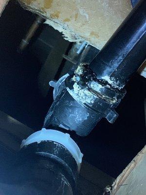 Broken pipe within ceiling wall