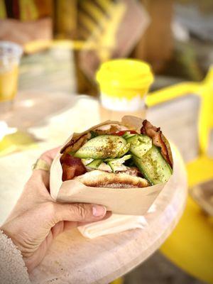 Cucumber, Za'atar seasoning, tomato, feta whip, bacon and egg, mint on an English muffin!  DELISH!  Horchata coffee in the background.