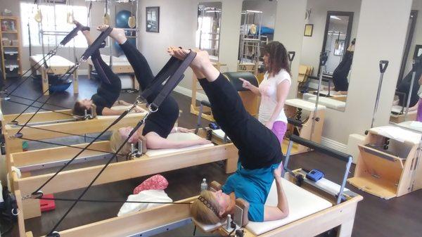 Short spine, legs in straps.  "A healthy spine is a flexible spine." ~Joseph Pilates