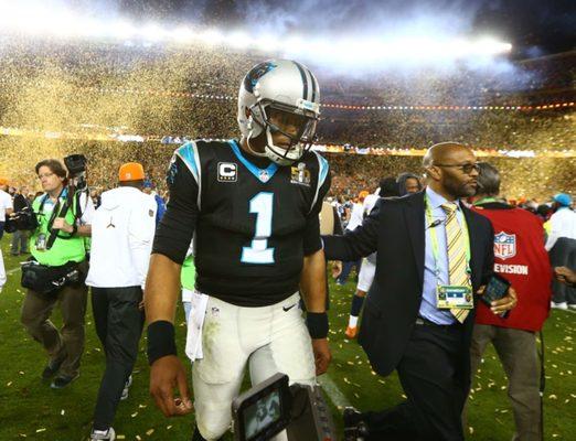 Cam Newton walks off the field following the Panthers' Super Bowl 50 loss to the Denver Broncos. February 7, 2016.