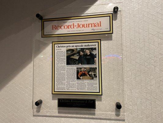 Framed newspaper article