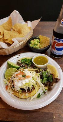 Chips and guacamole. Carne asada tacos, carne asada sope. Mexican Pepsi!