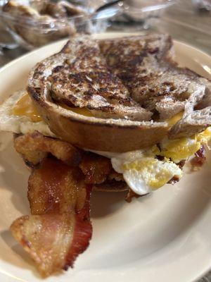 Bacon, egg, and cheese on cranberry walnut toast