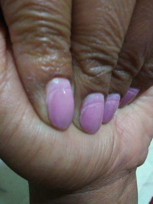 12 hours later not to cuticle, color change, you can see the light pink it was towards cuticles vs spotting purply pink on most of nails