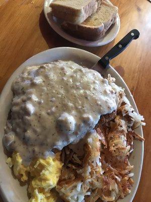 Chicken fried steak . crispy hash browns . Scrambled eggs.