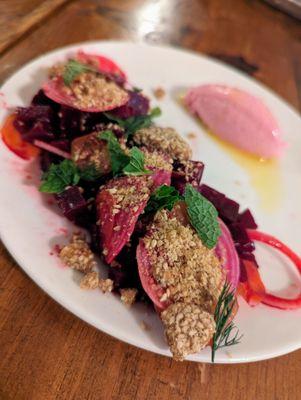 Remolacha. $14. Beet goat cheese mousse, spring onion, citrus roasted beets, benne brittle.