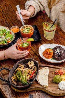 Margaritas, steak fajitas, rice, and beans