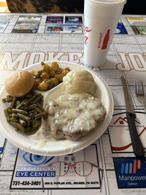 Country fried steak, okra,green beans and mashed potatoes with a roll