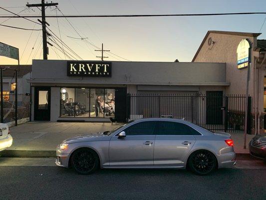 The front of the sleek modern barbershop   Lucky enough to get VIP parking.