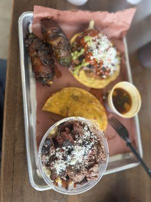 Tostada, birria taco, brisket elote, and two Texas twinkies