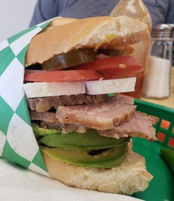 Fabulous fresh bread, avocado, pork, queso fresco, all the toppings.