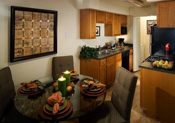 Model dining area at Cottonwood Creek Apartments in Littleton, CO