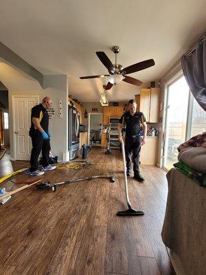 Dave and Steve cleaning some LVP/LVT flooring.