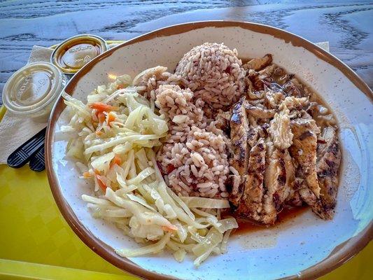 Boneless jerk chicken, rice & peas, and veggies