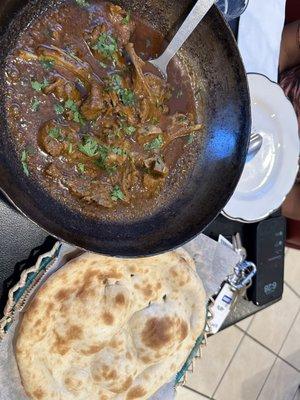 Best mutton ever....super delicious, soft and flavorful mutton gravy served with crispy naan is a must try