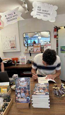 Author signing of Spoilers by Carlos Greaves