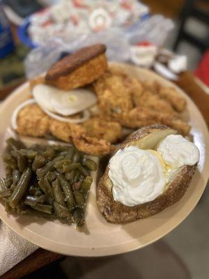 Frog legs, cornbread, beans, baked potato.