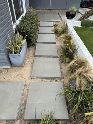 Stepping pads across the front of the house