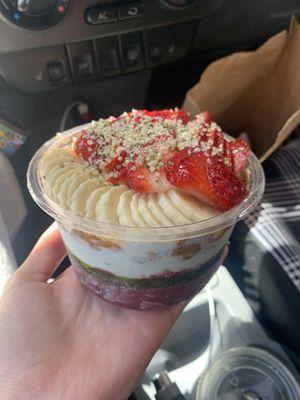 acai and blue spirulina base with almond butter, cacao nibs, banana, strawberry, and hemp hearts