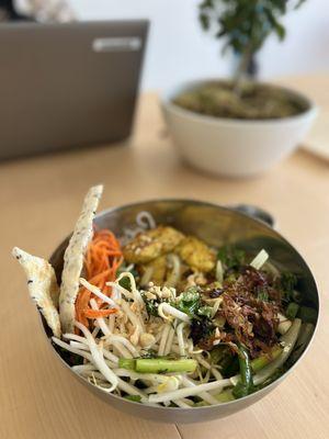 SIDE TOP angle view of Salad Noodle bowl (Bún) with Turmeric fish