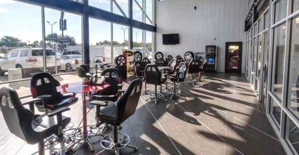 Southpoint Automotive presents a spacious showroom featuring a unique selection of wheels and comfortable seating for guests