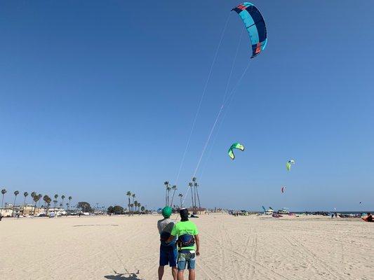 Our instructor Tom works on kite control with his student during his Newbie Lesson.