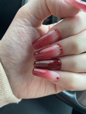 red ombre christmas nails with gems