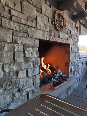 Fireplace next to table