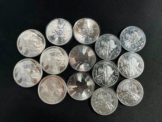 Silver coins and rounds purchased at Village Coin Shop.