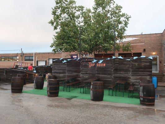 The back of their tap room patio, viewed from their parking area.