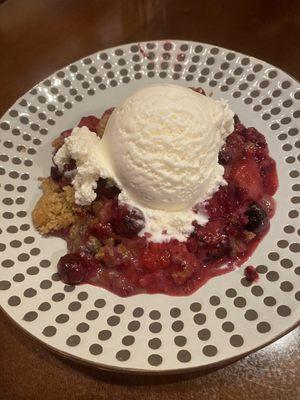 Berry cobbler with vanilla ice cream