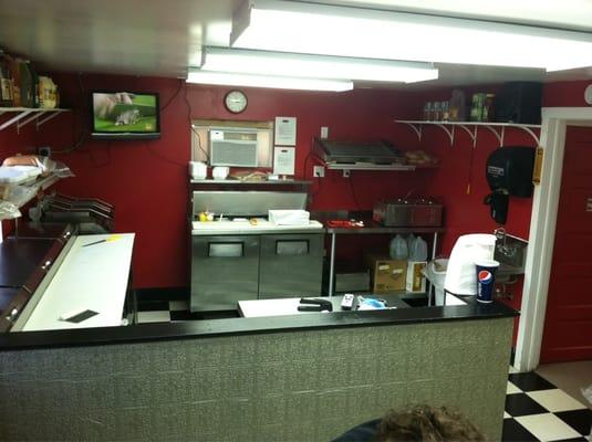 The make tables at Lee Street Deli. Everything is made right in front of you! They also have The Food Network playing on the TV.