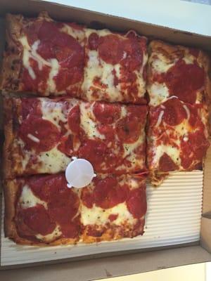 Great square pizza -- this one with extra sauce and pepperoni. A nice alternative to Jets' square.