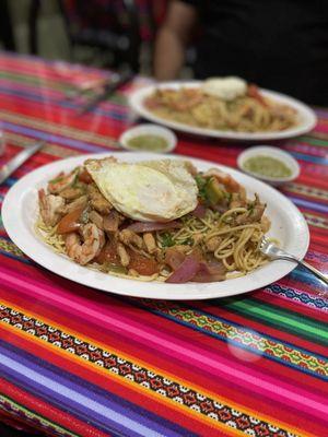 Tallarin saltado with an egg (highly recommend with noodles but I believe it normally comes over rice)