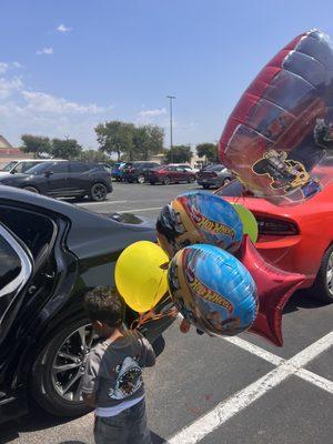 Surprise balloons for being a awesome kiddo during his 1st cut