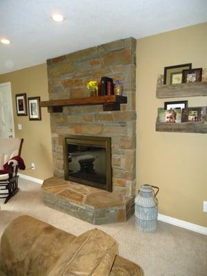 Indoor fireplace remodel on an existing red brick fireplace, Oregon City, natural stone, hearth, custom mantle, wood burning