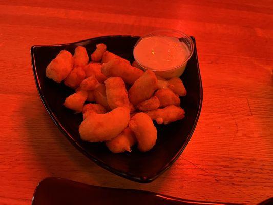 Cheese curds appetizer - from a pre-cooked bag, not hand tossed.