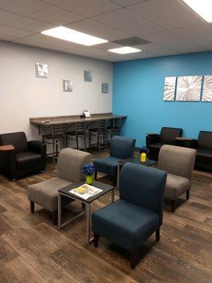 Comfortable waiting area inside OK Tire Store.