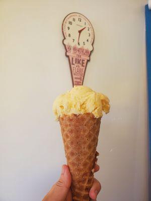 mango honey yogurt in a waffle cone