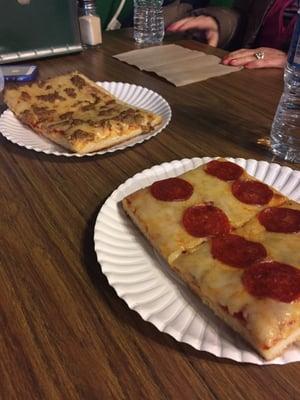 Pepperoni and sausage pizzas