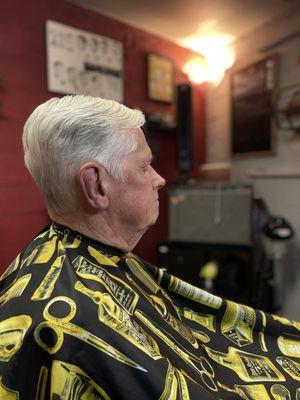 A classic gentleman's haircut by one of the best barber in the bay. A skillful scissor razor cut with a traditional taper.