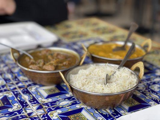 goat curry, rice,  and butter chicken