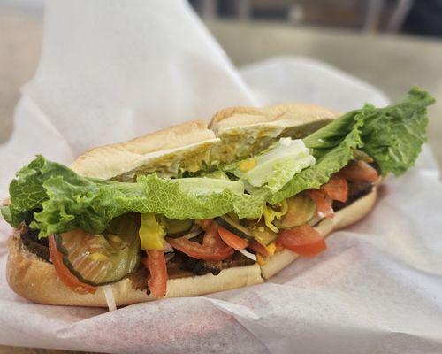 Vegan sandwich with Butcher's Son roast beef and loaded with veggies [$10]