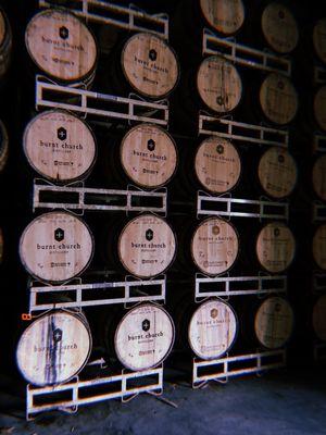 Bourbon barrels in warehouse