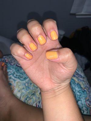 OPI gel polish changed colors the next day and no longer is solid orange & she did not paint all the way to the back.