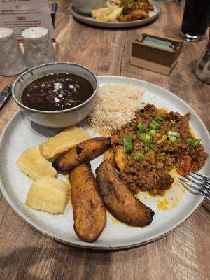 Picadillo, also on the plate, yucca, maduros, black bean soup